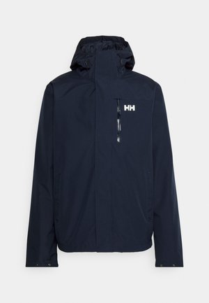 Marineblauwe waterdichte jas met een hoge kraag, verstelbare capuchon, voorrits, zijzakken en een wit logo op de borst. Soepele textuur.