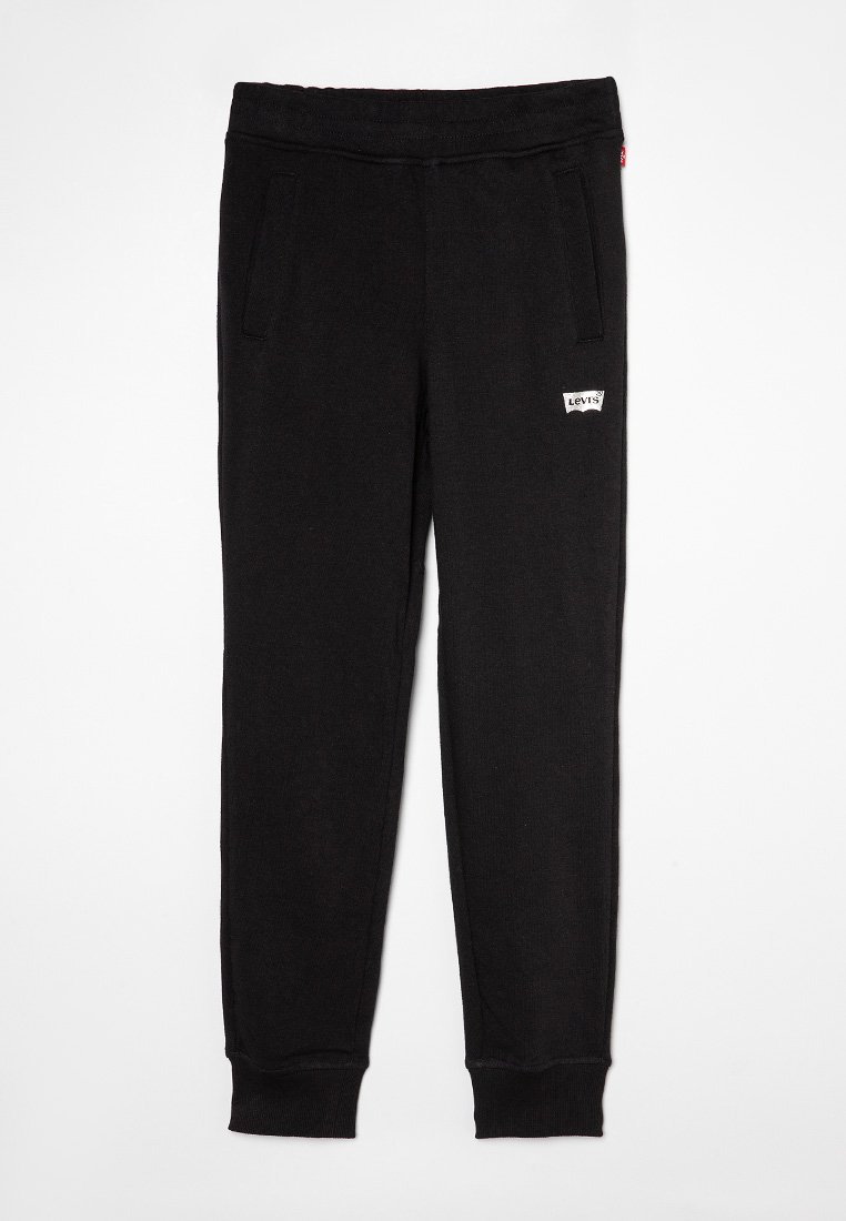 Pantalons de survêtement noirs avec taille élastique, deux poches latérales, poignets côtelés et un petit patch logo Levi's blanc sur le devant. Texture de tissu douce.