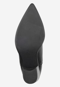 Chaussure à talon aiguille noire avec un bout pointu, tige en cuir lisse et semelle en caoutchouc texturé. Dotée d'un petit talon empilé. Taille 36.