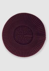 Berretto a maglia bordeaux con texture a coste e design circolare, caratterizzato da un motivo centrale intrecciato. Materiale morbido ed elastico.