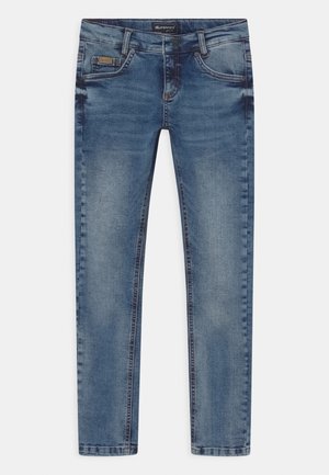 Blå slidte skinny jeans med fem lommer og knaplukning, med let whiskering og logomærke på det indvendige taljebånd.
