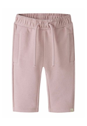 Pantaloni scurți moi roz pentru copii, cu talie elastică, rozete și buzunare laterale pe fundal alb.