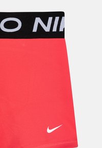 Nike Performance PRO UNISEX - Legingi - aster pink/white