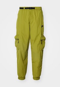 TECH WOVEN - Oldalzsebes nadrágok - pacific moss/black