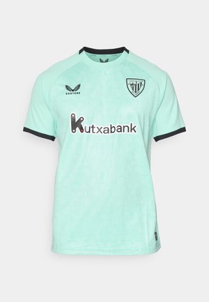 Φωτεινό τιρκουάζ ποδοσφαιρικό φανελάκι της Αθλέτικ Μπιλμπάο με μαύρες λεπτομέρειες, λογότυπο Castore και σπόνσορα Kutxabank στο μπροστινό μέρος.