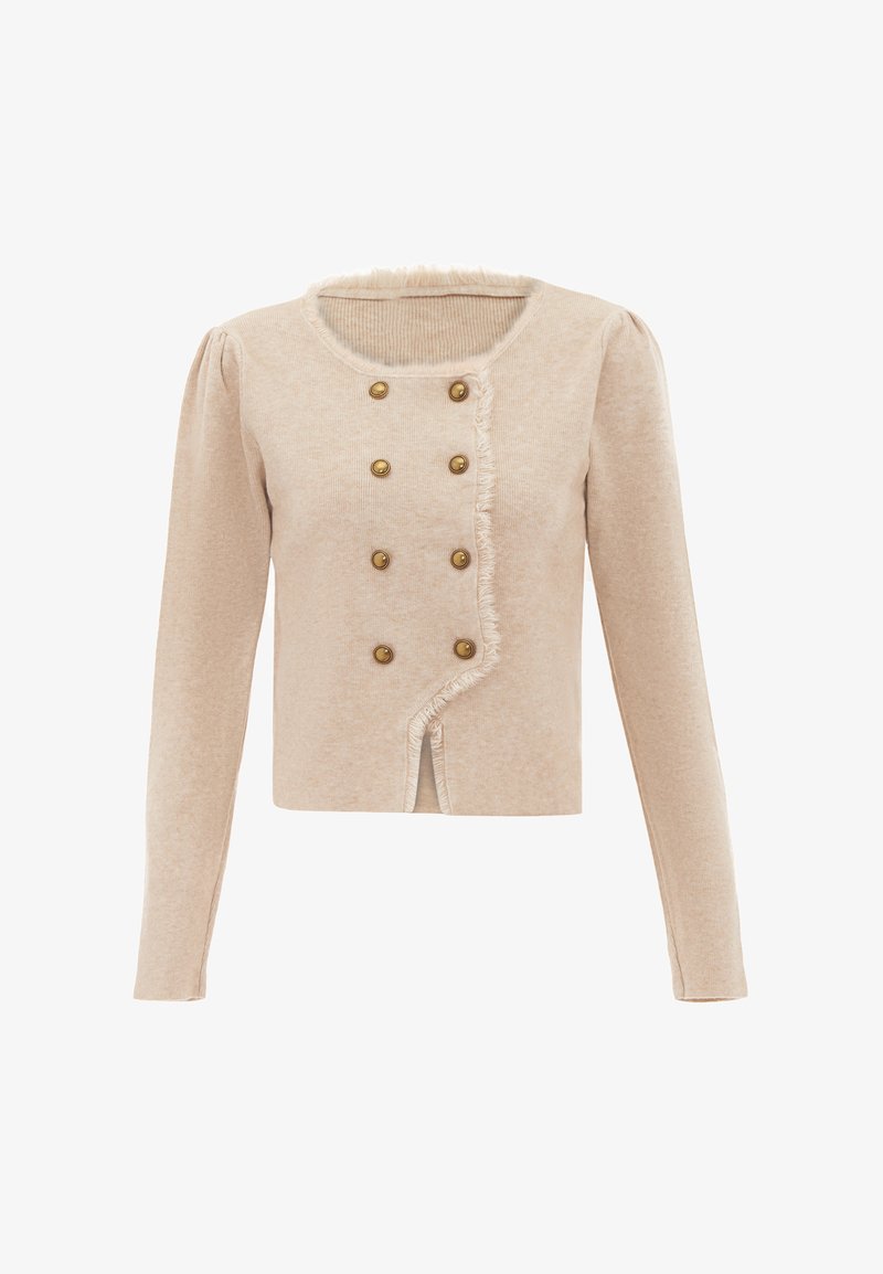 Beige pitkähihaista neuletakkia, jossa on pyöreä pääntie, frillimäinen reuna ja kuusi kultasävyistä nappia edessä. Pehmeä, tekstuuriainen kangas.