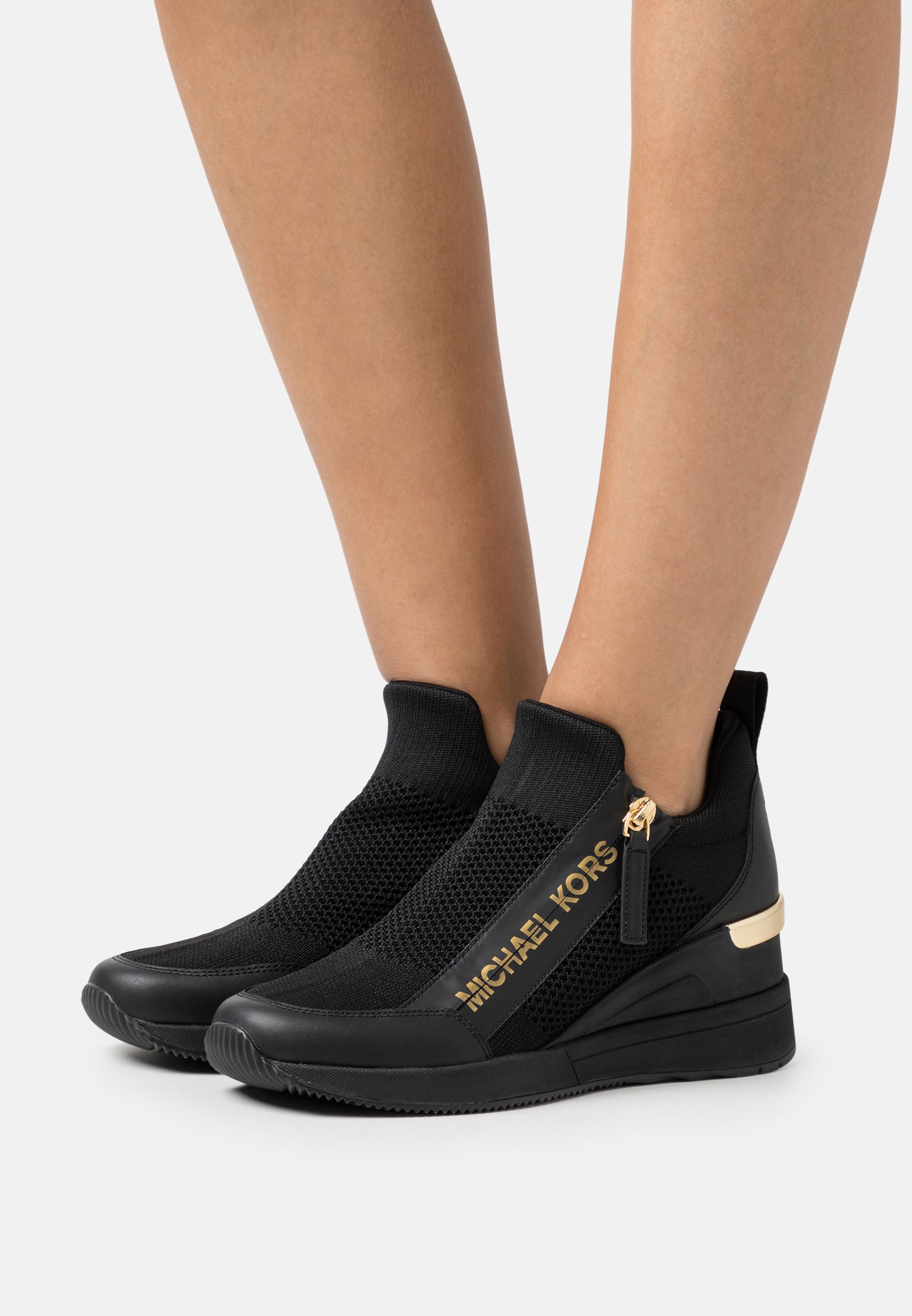 michael kors wedge trainer