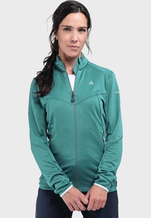 Giacca zip-up in teal realizzata in tessuto testurizzato. Presenta un colletto rialzato, due tasche laterali e polsini a contrasto. Design elegante con un logo minimale.