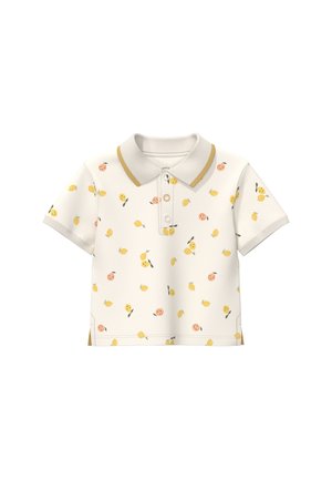 Polo crème à manches courtes avec motifs de fruits jaunes et pêche, bordure moutarde sur le col, et trois boutons sur la patte de boutonnage.