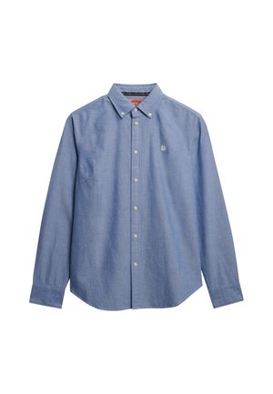 Lyseblå langærmet skjorte med knaplukning i chambray-stof. Har en klassisk krave, hvide knapper og et lille broderet logo på brystet.