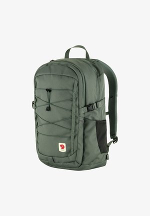 Green fabric backpack with a structured design, featuring adjustable straps, a front bungee cord, and a black side pocket.