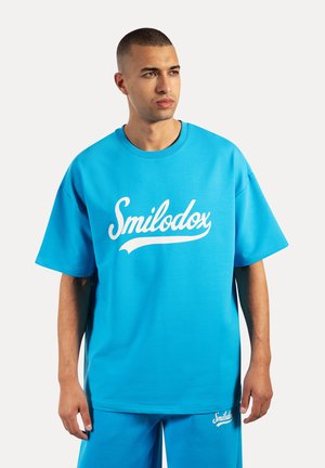 LORIK - Camiseta estampada - hellblau