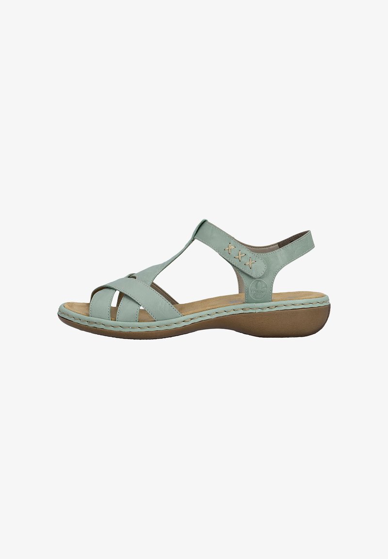 Sandale ouverte en cuir vert clair avec bride réglable à la cheville, semelle intérieure rembourrée, semelle cousue et petit talon compensé.