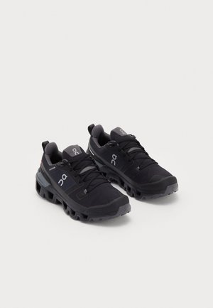 On CLOUDWANDER WATERPROOF - Walking shoes - black eclipse