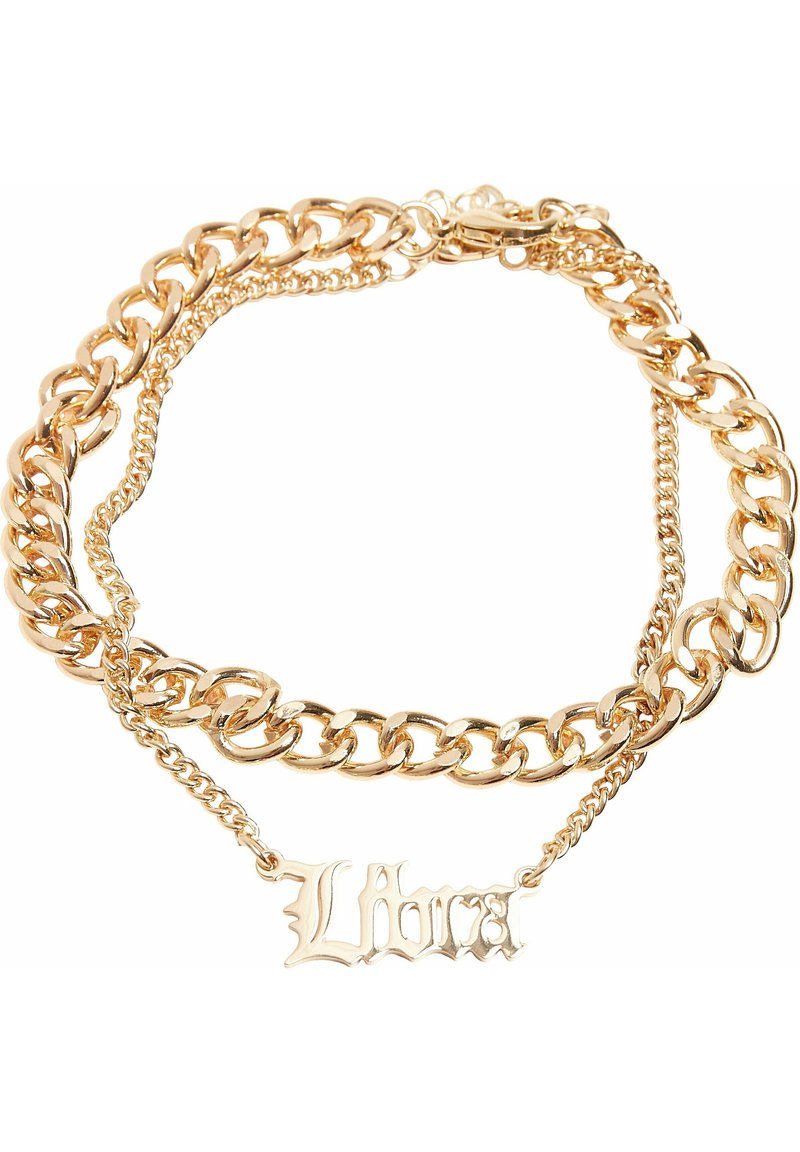 Gullfarget halskjede med sammenflettede tykke og tynne kjeder, med en iøynefallende "Libra"-anheng i en utsmykket skrifttype.