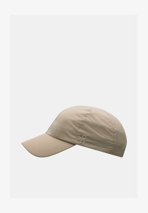 Beige pet met een ronde kroon en een stijve rand. Gemaakt van lichtgewicht, gestructureerde stof. Beschikt over een geborduurd logo aan de zijkant.