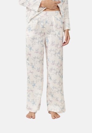 Pantalones de pijama de algodón con un fondo crema, que presentan un patrón juguetón de gatos y cintas en azul y rosa. Corte holgado con cintura elástica.