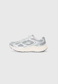 Light gray and white running shoe with mesh panels, lace-up design, and thick cushioned sole labeled "GoRun."