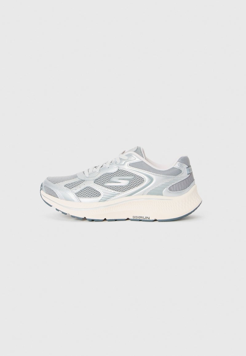 Light gray and white running shoe with mesh panels, lace-up design, and thick cushioned sole labeled "GoRun."