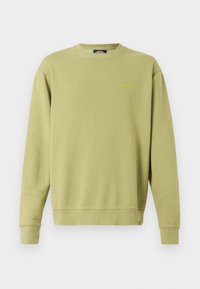Sweat-shirt vert clair à col rond avec manches longues et petit logo brodé sur le côté gauche de la poitrine.