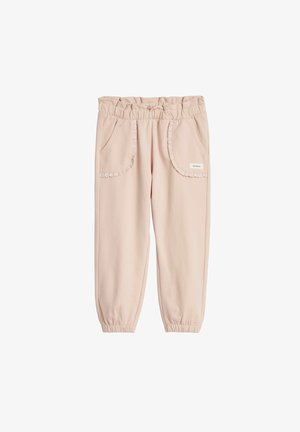 Jasnoróżowe spodnie dresowe wykonane z miękkiego materiału, posiadające elastyczną talię, dwie przednie kieszenie z falbankowymi brzegami oraz elastyczne ściągacze.