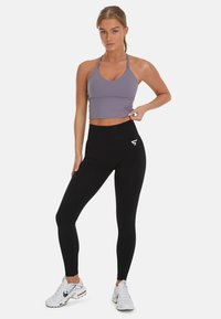 SQUATPROOF REPOSE ACTIVE  - Top - purple quartz