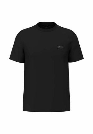 T-shirt nera a maniche corte con scollo tondo e piccolo logo "GUESS" bianco sul petto a sinistra.