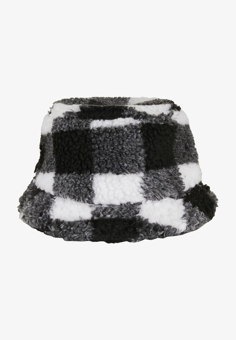 Mustra mustril, musta, valge ja halli ruuduline konvex müts, millel on tekstuuriga fliismaterjal pehme viimistluse ja ümar äärega.