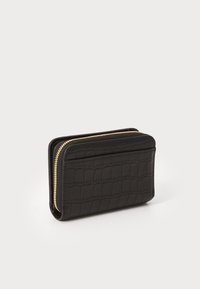 Compact black wallet with crocodile texture, gold zipper closure, and a flat pocket on the front, set against a plain white background.