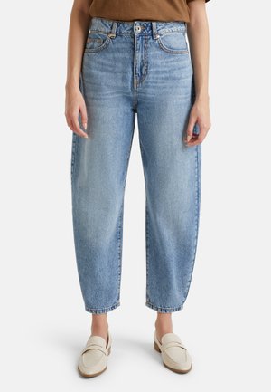 Light blue high-waisted jeans with a relaxed fit, slightly tapered legs, front pockets, and visible stitched detailing.