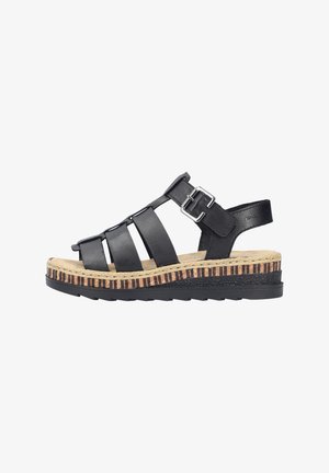 Sandalias de cuero negro con múltiples correas, hebilla ajustable y un tacón que presenta una plataforma de estilo espadrille texturizada y rayada.