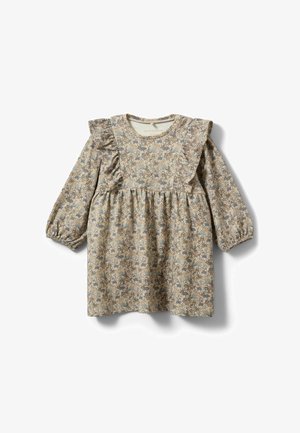 Ilgomis rankovėmis suknelė smėlio spalvos su gėlių raštais, raukiniais ant pečių ir aptemptu liemeniu, pereinančiu į laisvą, suknelės sijoną, surinktą raukėmis.