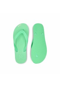 Green flip-flops with a smooth rubber upper and textured sole. Features a star-shaped logo on the footbed and pronounced ridges on the sole.