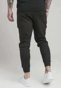 SIKSILK Teplákové kalhoty - black