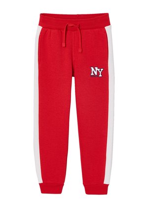 Red sweatpants with white side stripes, elastic waistband with drawstring, cuffed ankles, and "NY" logo patch on left thigh.