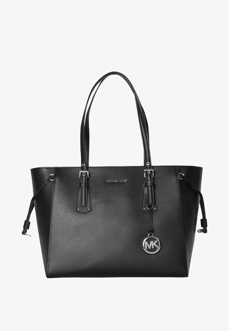 Sac cabas noir Michael Kors en cuir avec double anse d'épaule, pendentif logo argenté et détails de cordon latéraux.