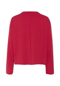 Rød langærmet bluse, blødt strikmateriale, afslappet pasform, rund halsudskæring og detalje i rygsøm. Ingen synlige lukninger eller udsmykninger.