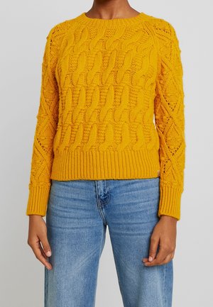 Stickad tröja - ochre