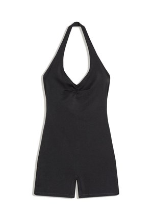 Čierny overal s halterneck a hlbokým výstrihom do V, krátkymi nohavicami, hladkou tkaninou a jemným nariasením v strede na hrudi.