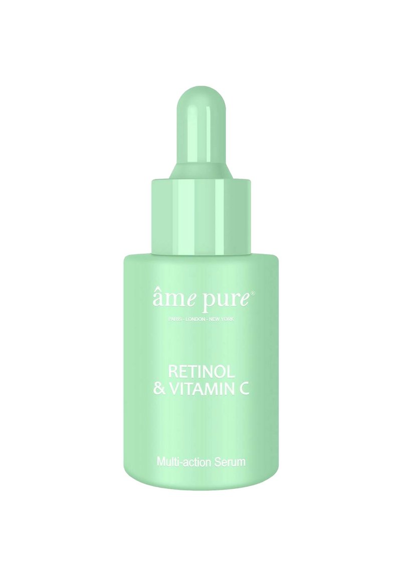Grön glasbehållare med pipett märkt "Retinol & Vitamin C Multi-action Serum" med en blank yta och rund pipettopp.