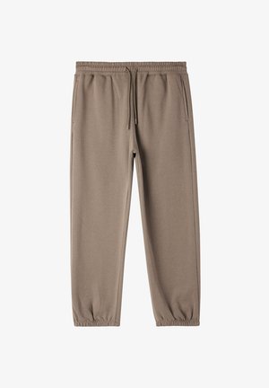 Niebieskie spodnie dresowe wykonane z miękkiego materiału. Posiadają elastyczny pas ze sznurkiem, zwężane nogawki oraz kieszenie boczne. Gładka faktura.