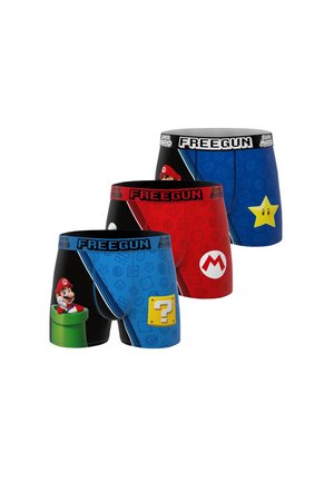Trois paires de boxers à thème Super Mario en bleu, rouge et noir, avec des motifs de Mario, une étoile et un bloc de question.