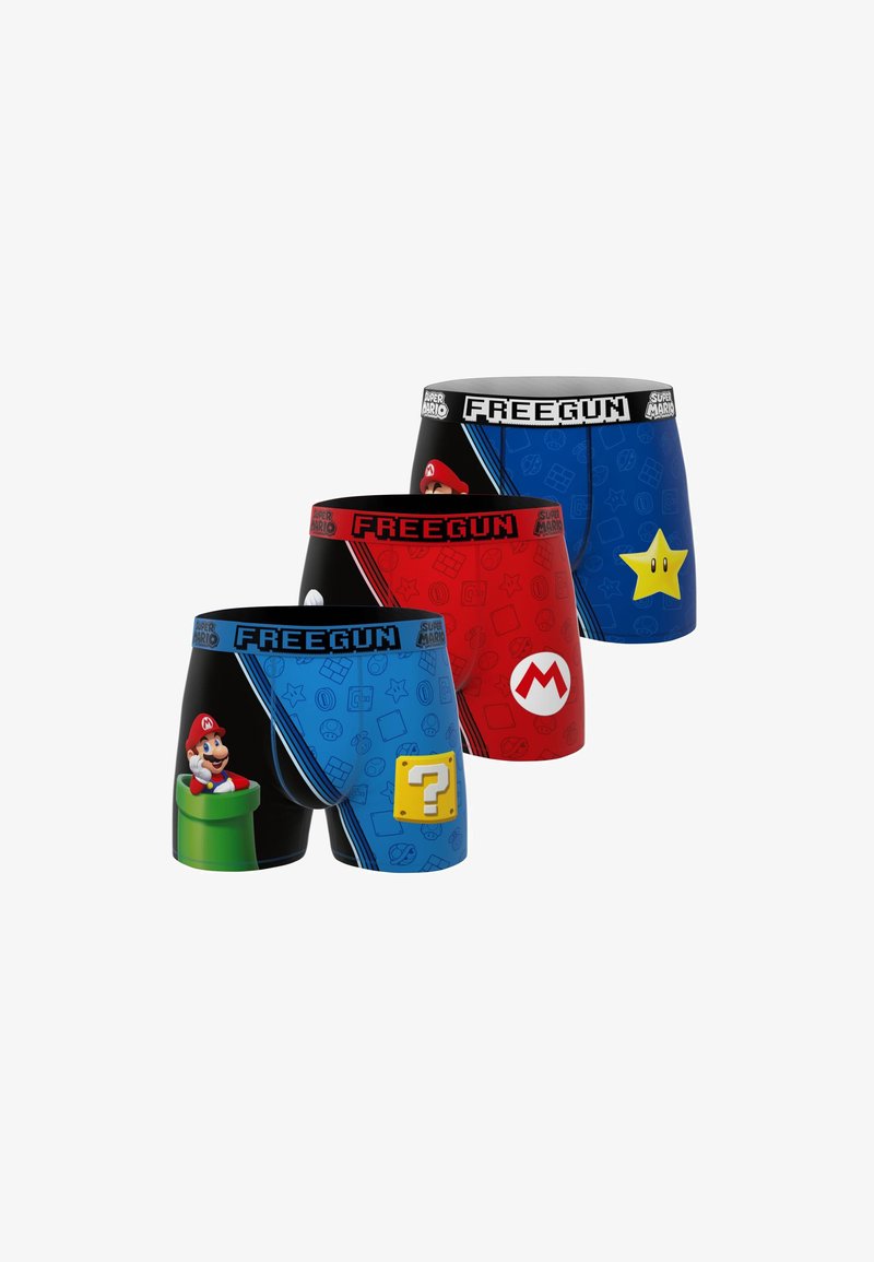 Trois paires de boxers à thème Super Mario en bleu, rouge et noir, avec des motifs de Mario, une étoile et un bloc de question.