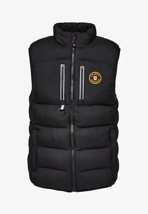 Mustapufferwest, jossa on korkea kaulus, vetoketjukiinnitys ja logopatch. Varustettu kahdella vetoketjullisella taskulla ja tekstuurillisella, tikkikuvioidulla muotoilulla.