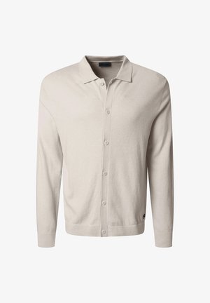 Lichtbeige vest gemaakt van zachte gebreide stof. Heeft een kraag, knoopsluiting aan de voorkant, lange mouwen en geribbelde manchetten.