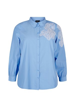 Light blue button-up shirt with long balloon sleeves, featuring white lace leaf embroidery on the right shoulder and a classic collar.