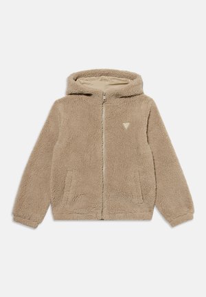 Veste polaire douce beige avec capuche, fermeture éclair intégrale à l'avant, poches latérales et poignets élastiques, présentée à plat sur fond blanc.