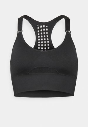 Črn športni modrček z teksturiranim sprednjim delom in mrežastim hrbtom, ki se ponaša s krožnimi izrezi. Dodatni nastavljivi naramnici in brezšivna konstrukcija za udobje.