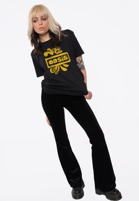Paradiso Clothing DRAWN BAND LOGO - Print T-shirt - black