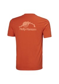 Oranžové tričko s krátkým rukávem vyrobené z bavlny, s grafickým motivem světlých hor a slunce na zádech, doplněné textem "Helly-Hansen".